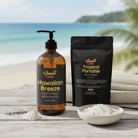 Goat Milk Bath Gift Set featuring Hawaiian Breeze Body Wash and Tropical Paradise Bath Soak on a serene beach backdrop.