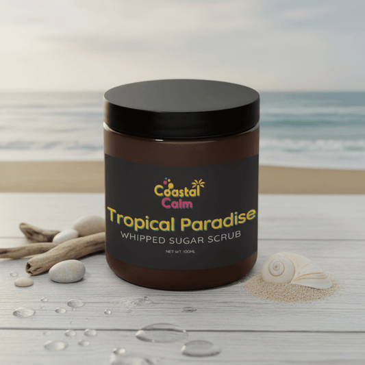 Jar of 'Tropical Paradise' whipped sugar scrub with a beach-themed background