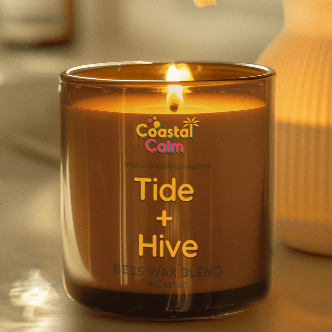 Tide & Hive Beeswax Candle in amber glass jar with Coastal Calm label, ideal for coastal decor and natural, fragrance-free home ambiance.